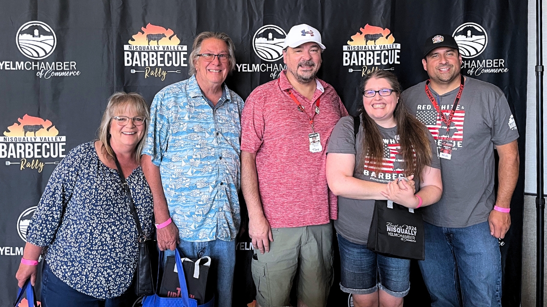Graham Auto Repair representative with Pacific Northwest BBQ Association Judges at BBQ Rally